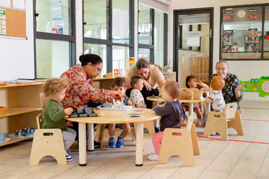 Infants during Montessori work cycle at Belmore Montessori Academy
