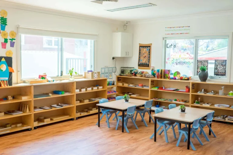 Montessori classroom at Condell Park Montessori Academy with activity tables and learning shelves