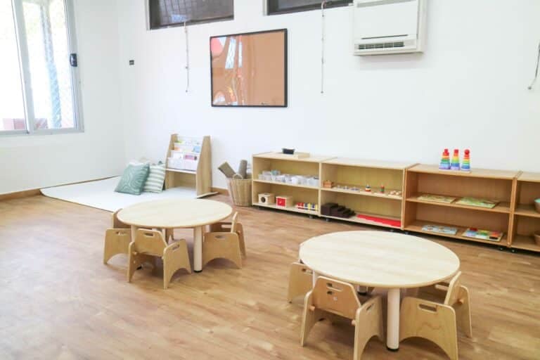 Low open shelving and Montessori materials inside a Montessori preschool in Sydney Australia