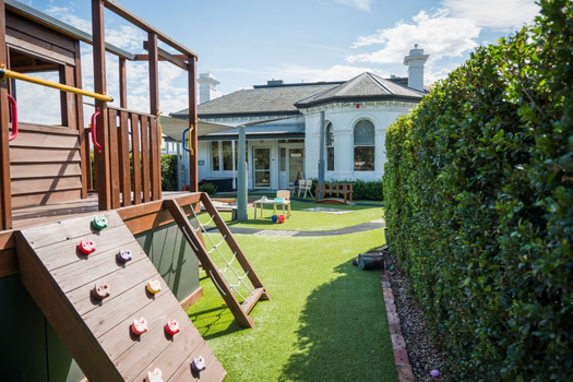 Outdoor climbing fort and play area at Elsternwick Montessori Academy childcare and kindergarten.