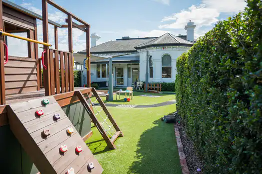 Outdoor climbing fort and play area at Elsternwick Montessori Academy childcare and kindergarten.
