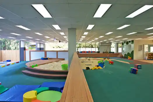Large indoor play environment at Macquarie Park Montessori Academy childcare centre