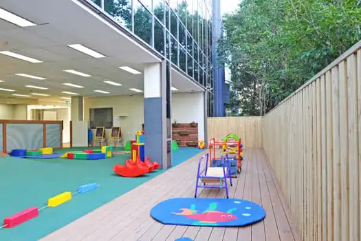 Outdoor play deck at Macquarie Park Montessori Academy childcare centre