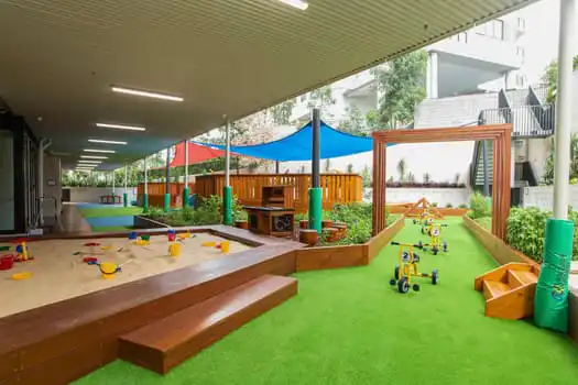 Sandpit and outdoor play space at Midtown MacPark Montessori Academy childcare