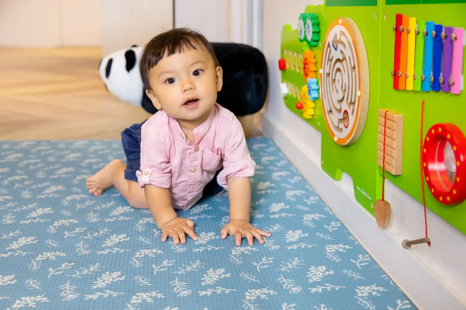 Achieving physical development milestones such as crawling, walking, climbing and jumping