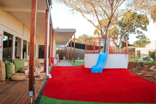 Narellan Montessori Academy Childcare Centre Outdoor playground photos featuring tree fort