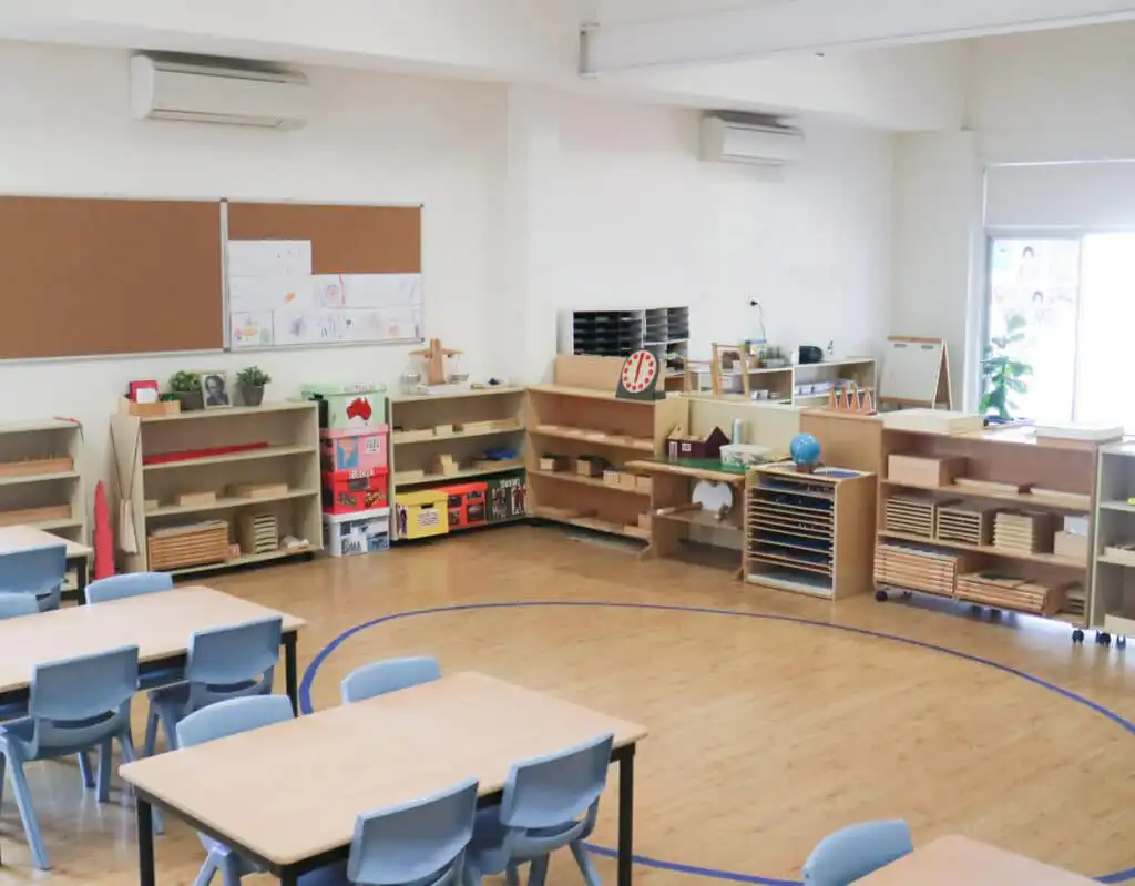 Montessori classroom at North Parramatta Montessori Academy with child-sized tables and prepared learning materials