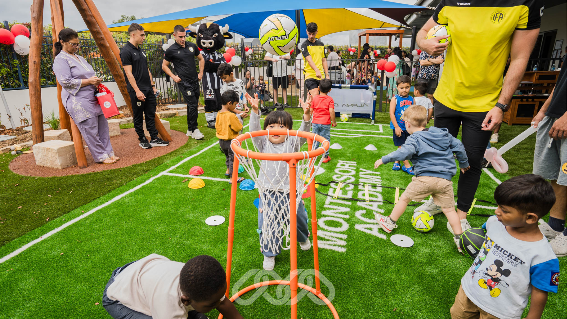 IFA Sports leading children’s sporting activities alongside Arthur the Bull at the Gregory Hills Childcare Grand Opening in Gregory Hills NSW.