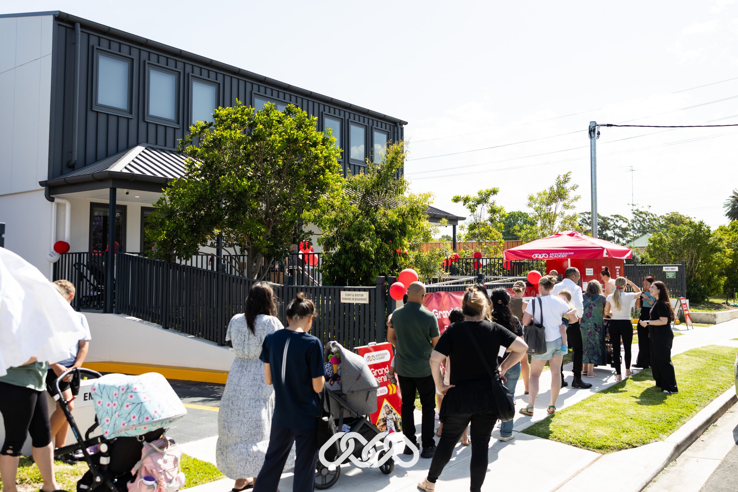 Families lining up to enter the Penrith Derby Street grand opening event outside the centre.