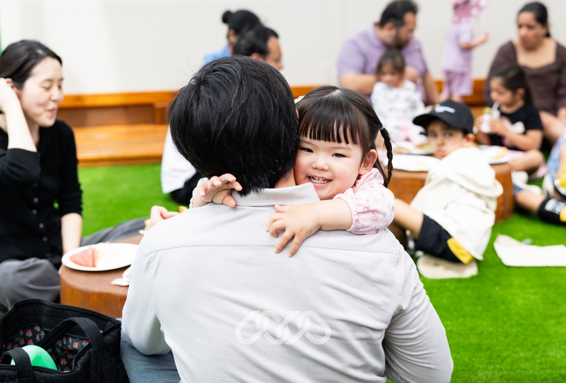 Families enjoying the grand opening event at Winston Hills Montessori Academy