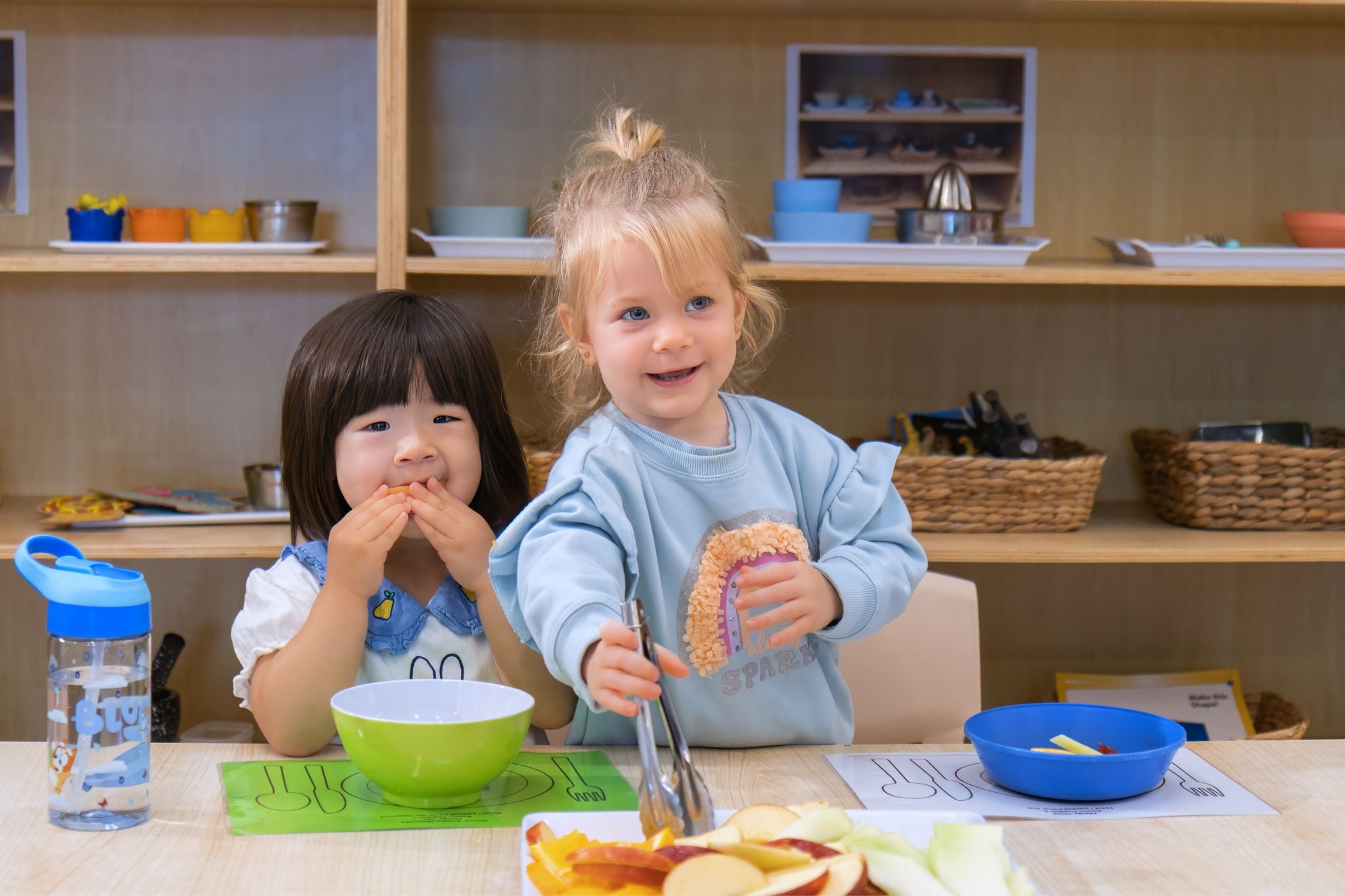 Children enjoying meal times at Montessori Academy