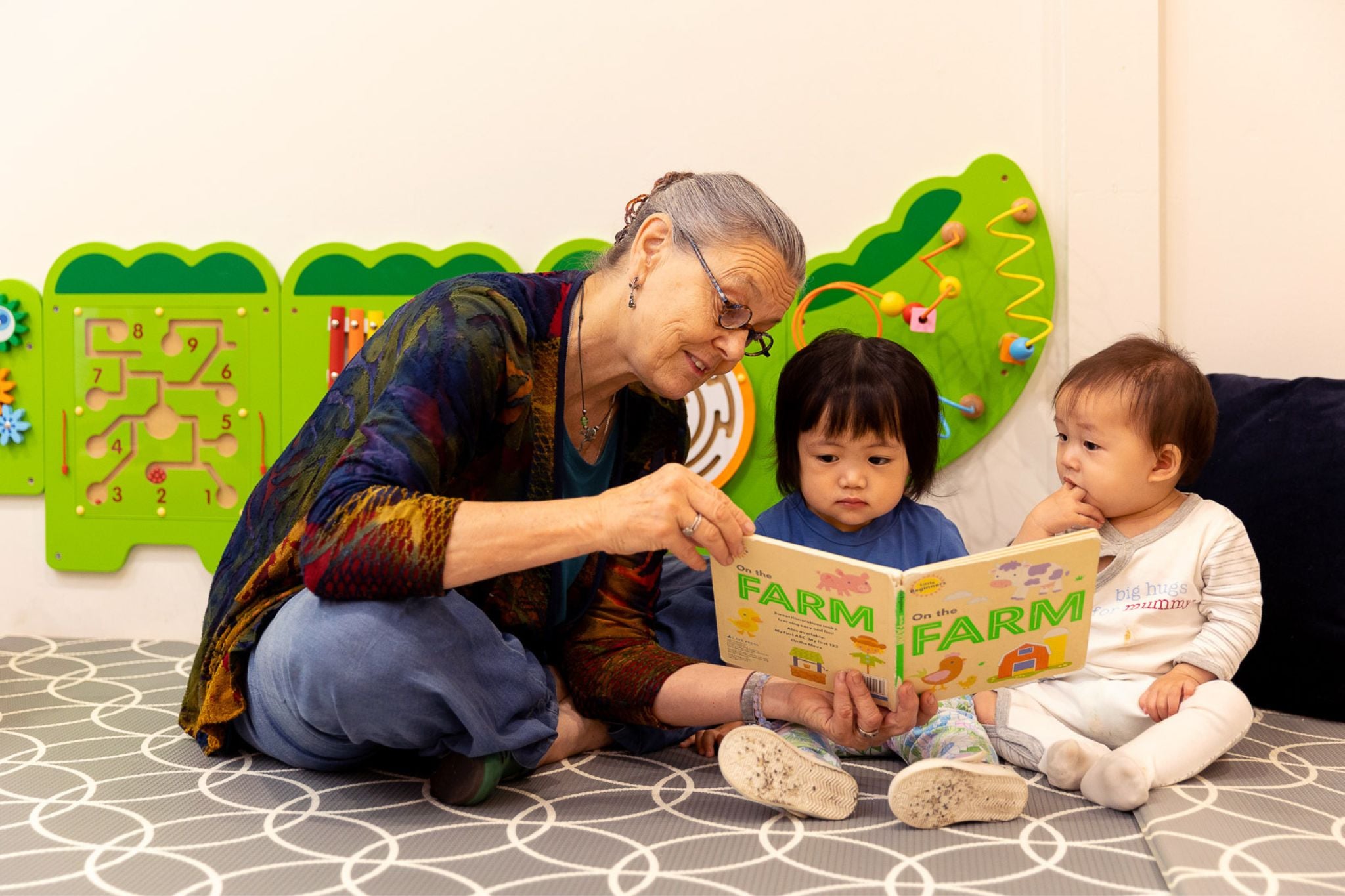 Children resting and enjoying quiet activities at Montessori Academy