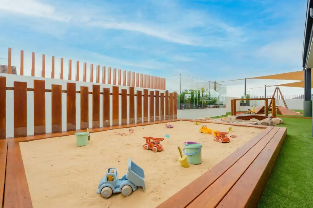 Sandpit play area at Leppington childcare centre with outdoor learning and nature play space