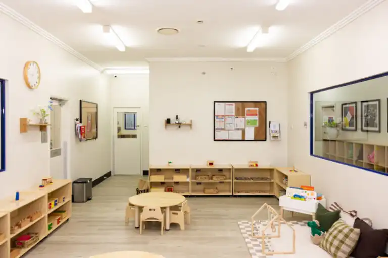 Montessori classroom at Mount Annan childcare with low shelves, learning materials and quiet play area