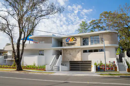 Exterior of Winston Hills Montessori Academy childcare and preschool surrounded by established gardens and family-friendly neighbourhoods.