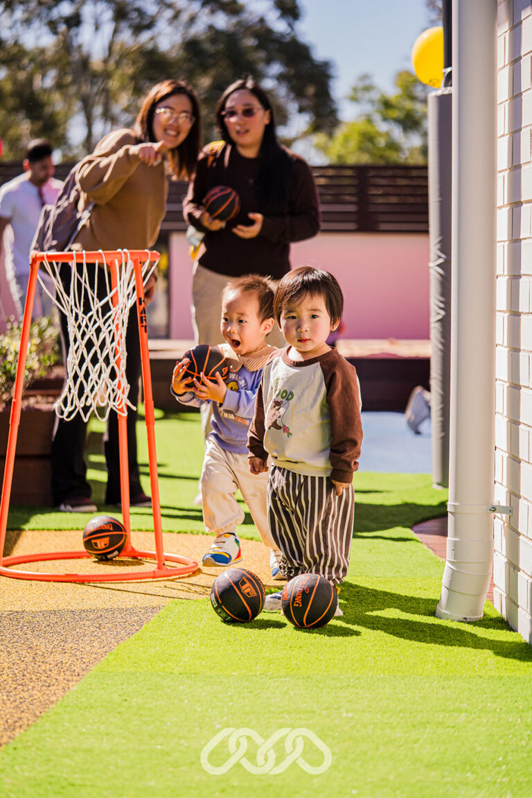 Children enjoying outdoor activities at the Northmead Montessori Academy Grand Opening.
