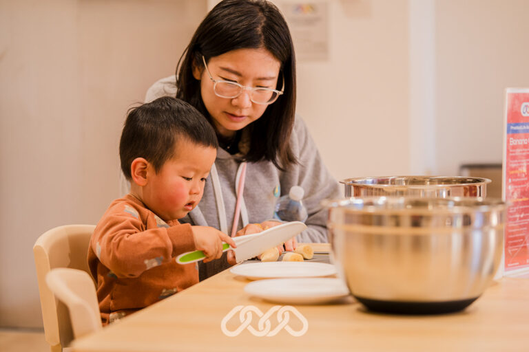 Parent and child exploring a Montessori activity at Northmead Montessori Academy.